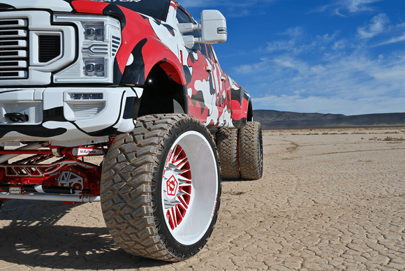 Ford F450 truck with large wheels on a desert landscape Predator - New Mutant X-MT Range