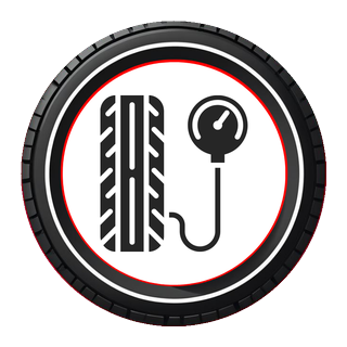 Tyre tread beside a pressure gauge