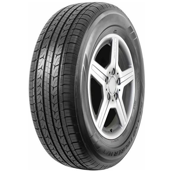 Close-up of Joyroad Grand Tourer HT tire on a wheel, highlighting tread pattern and branding on a white background.
